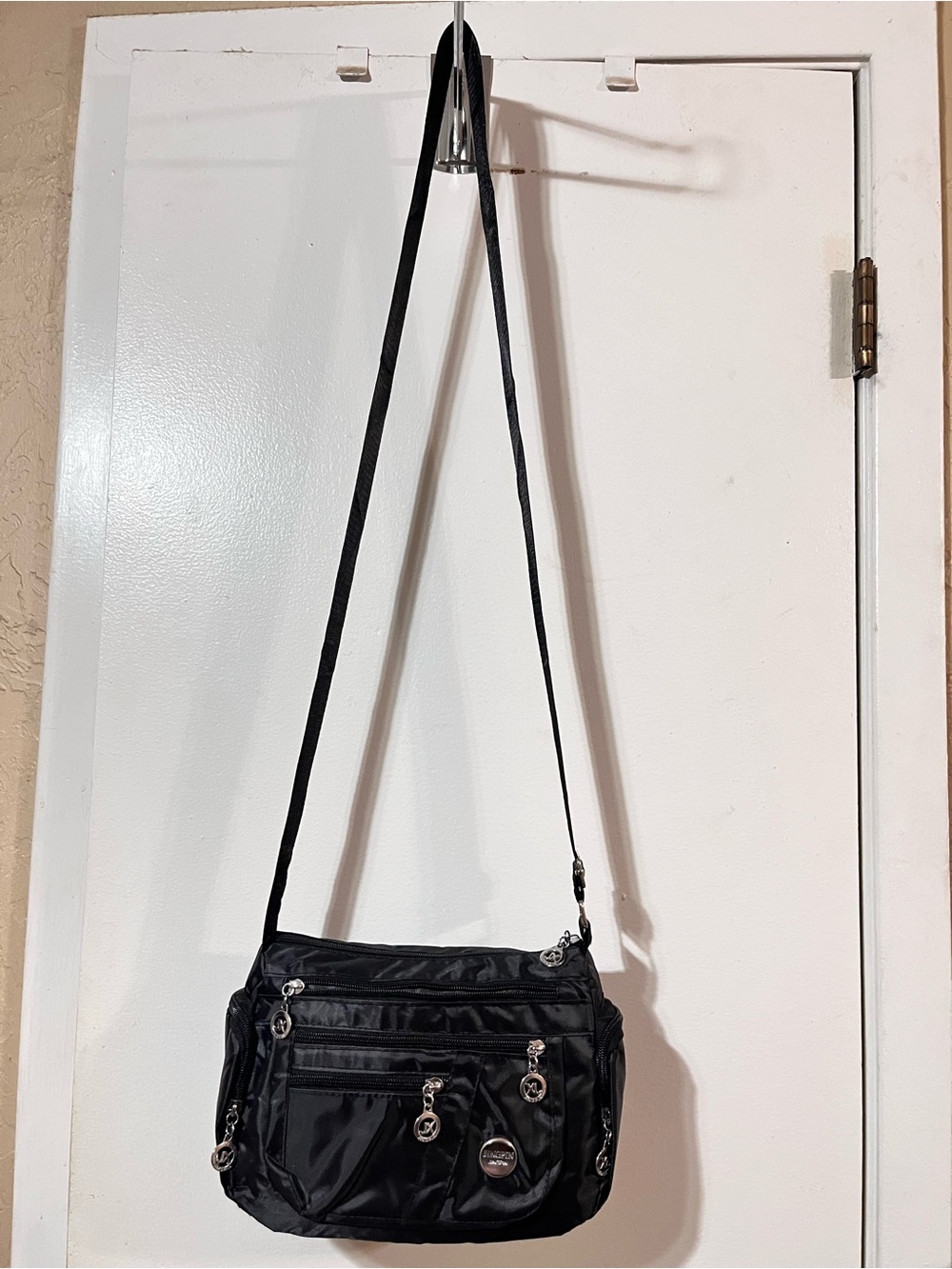 JINGPIN Black Crossbody Travel Bag with Multiple Zip Pockets